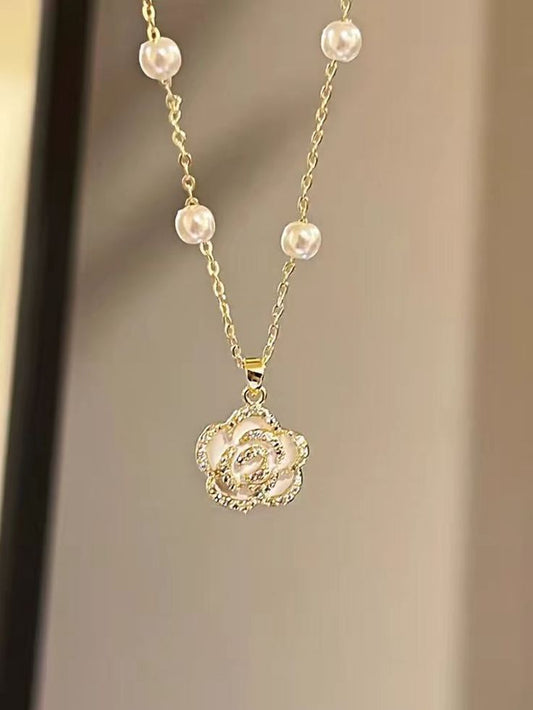 Pearl and flower necklace